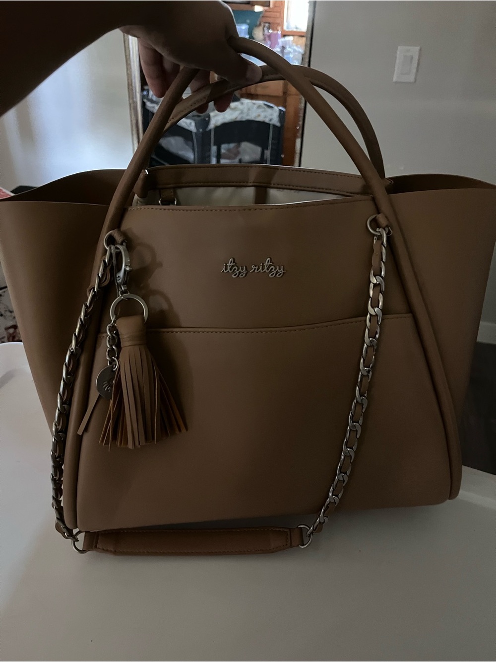 Itzy Ritzy Tan Faux Leather Tote with Tassel Charm